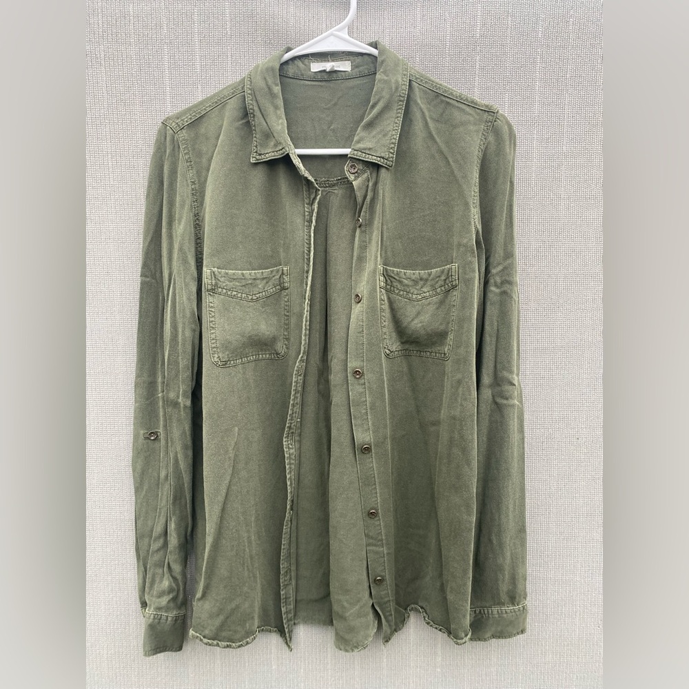 Maurice’s green button down, tagged small